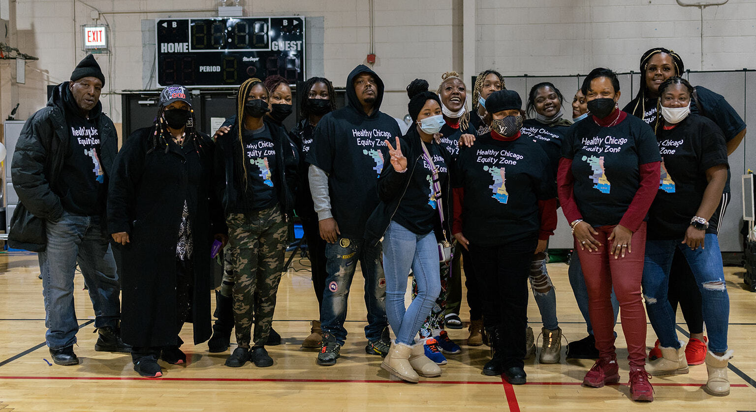 Volunteers wearing healthy Chicago Equity Zone t-shirts